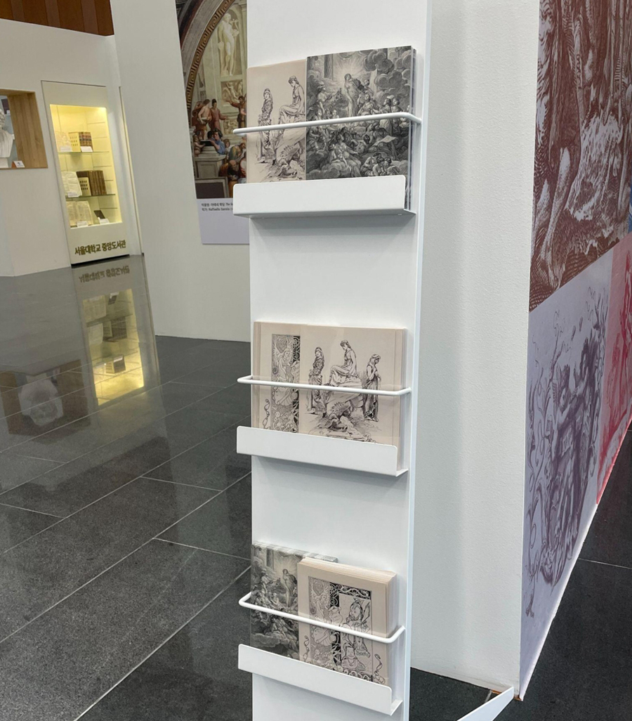 Complimentary postcard station: Personalized souvenirs to take home